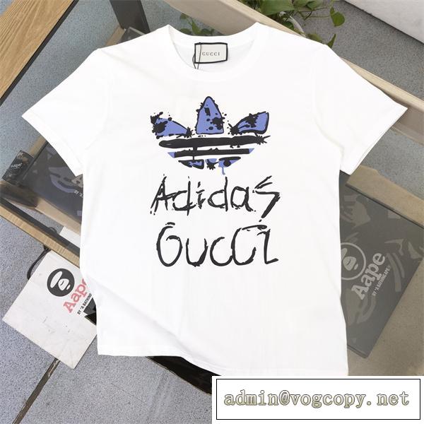 ☆GUCC1 スーパーコピー Tシャツ AdidasｘGUCC1コラボ 蓮 花柄 ロゴ 落書き 男女兼用