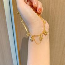 肌を華やかに ルイヴィトン 偽物 ブレスレット モノグラム フラワー LOUIS VUITTON ゴールド 調節可能サイズ 