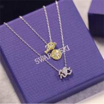 SWAROVSKI 偽物 ネックレス 3連チェーン サンバースト型チャーム クリスタル装飾 スワロフスキー