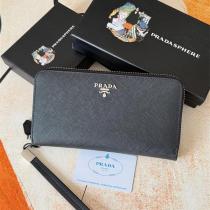 注目 PRADA コピー 財布 サフィアーノレザー ロゴプレート ラウンドジップ 長財布 プラダ