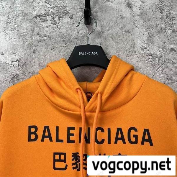 BALENCIAGA スーパーコピー パーカー 多言語 ロゴ オレンジ ロゴ 